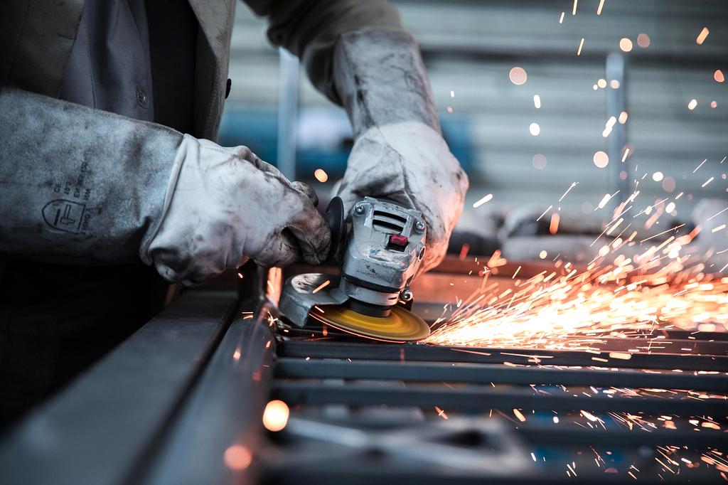 Professional analyzing data in industrial setting